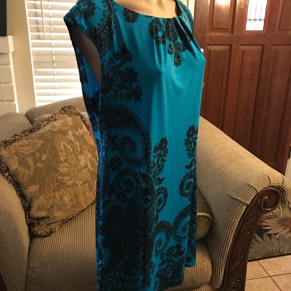 Beautiful dress, one small stain on chest